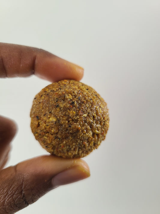 Ginger Ball snack bite with Turmeric, Honey, Cinnamon, nutmeg, and Coconut Flakes. (5 balls each pack) Individually wrap.